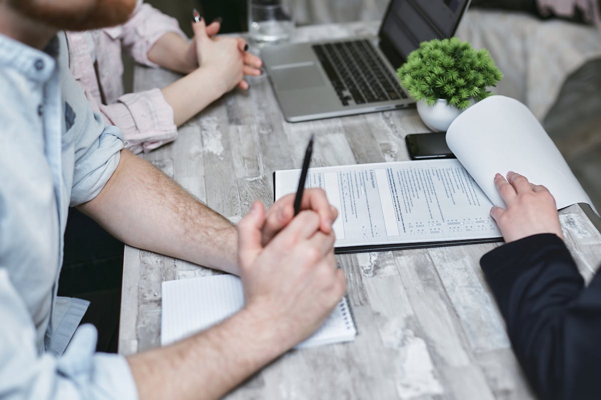 A Document Ready to Be Sign on the Table