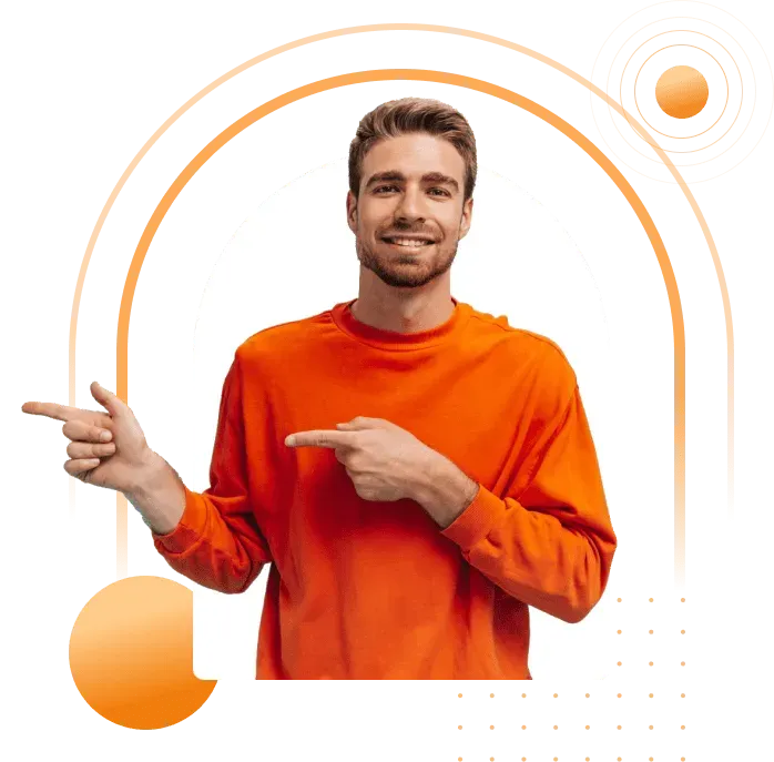 Smiling man in an orange sweater pointing to the course details
