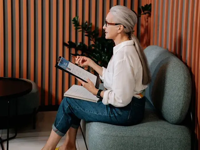 Real estate professional reviewing notes before a podcast appearance