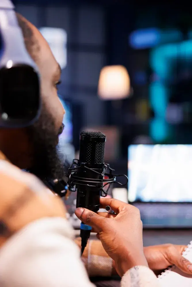 Close-up of a podcast microphone in a studio
