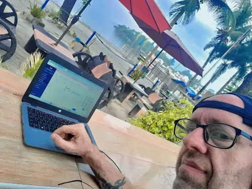 Sean Church working on a laptop