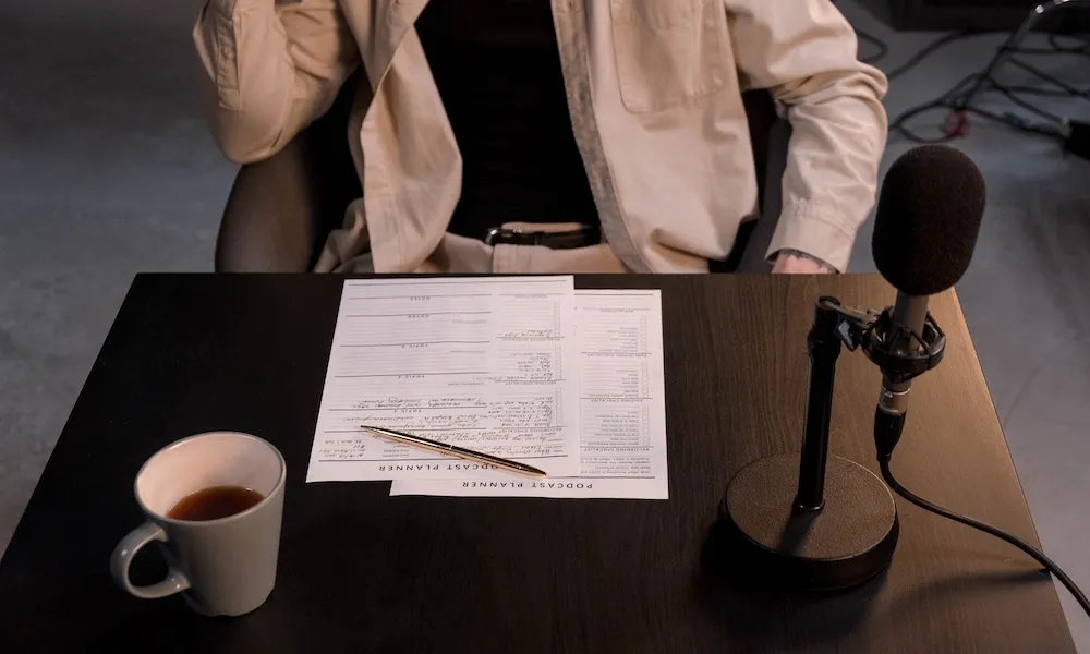 A real estate agent going through some podcast notes