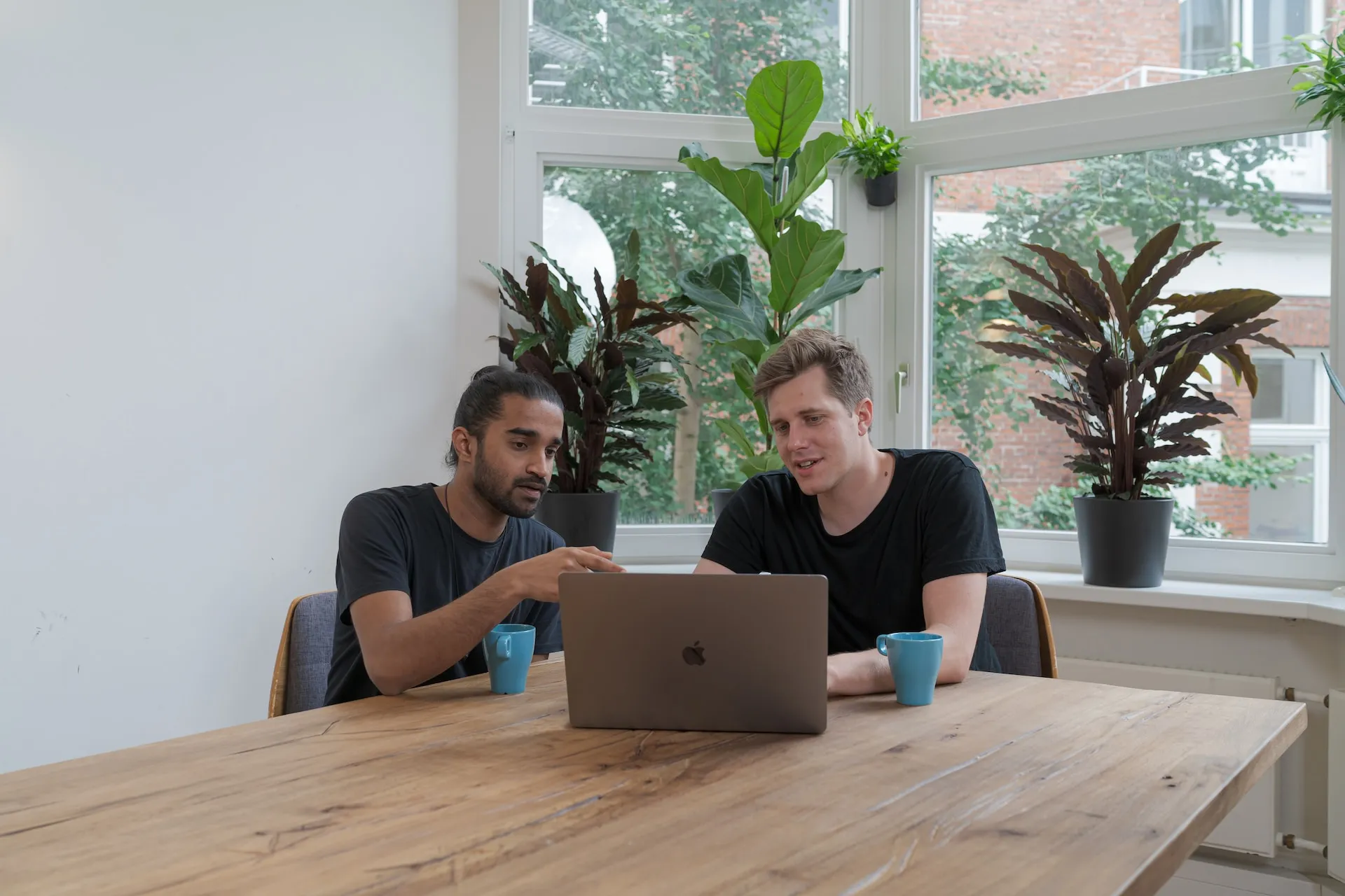 An experienced real estate investor teaching his apprentice what he knows.
