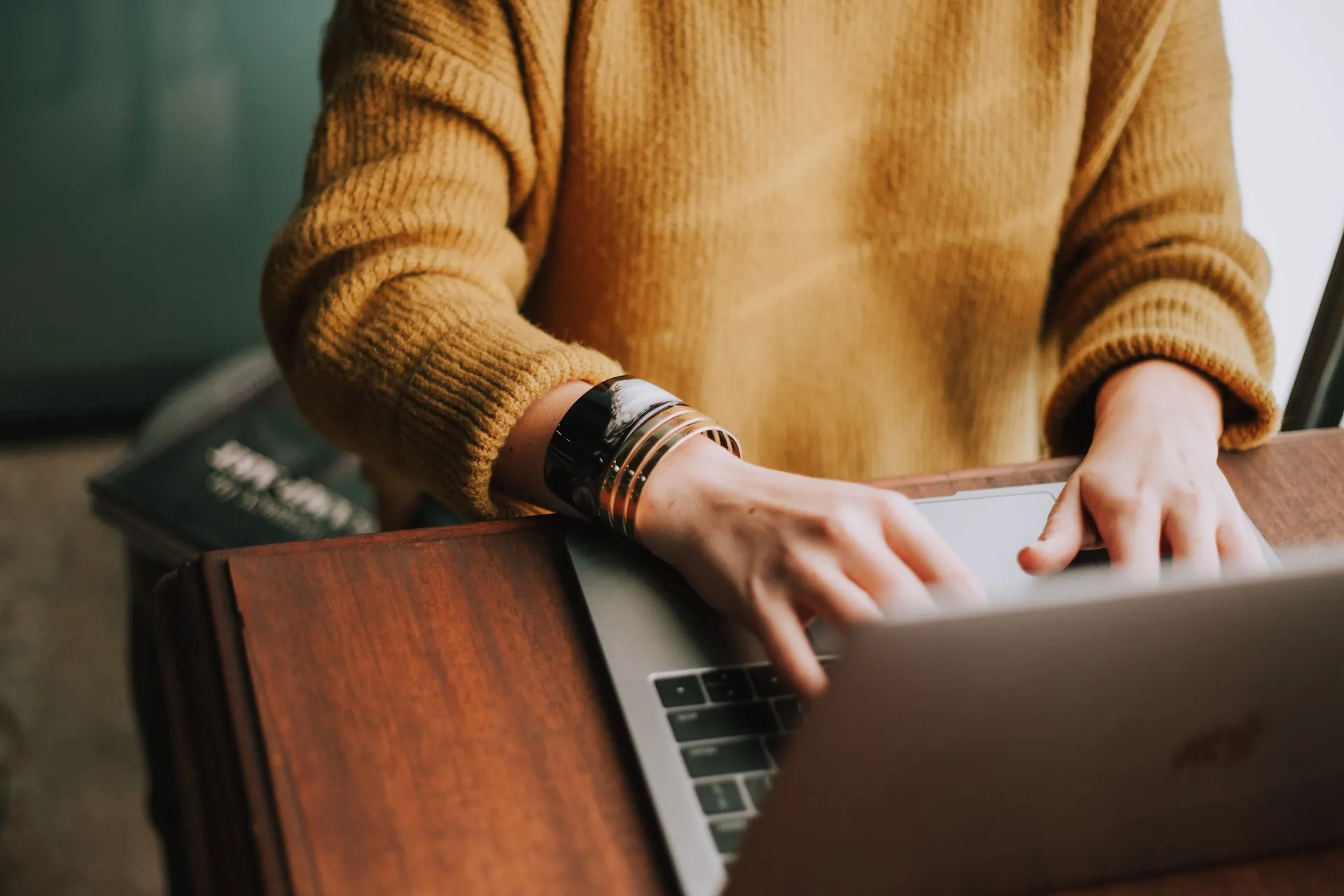 Woman sharing her podcast targeting real estate investors on social media.