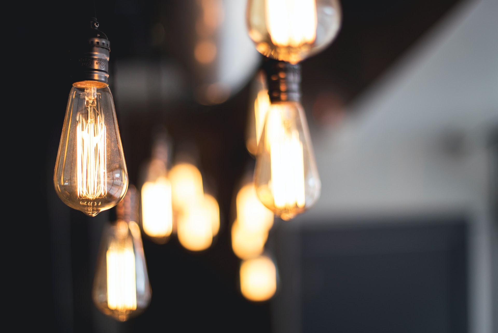 Light bulbs hanging from the ceiling.