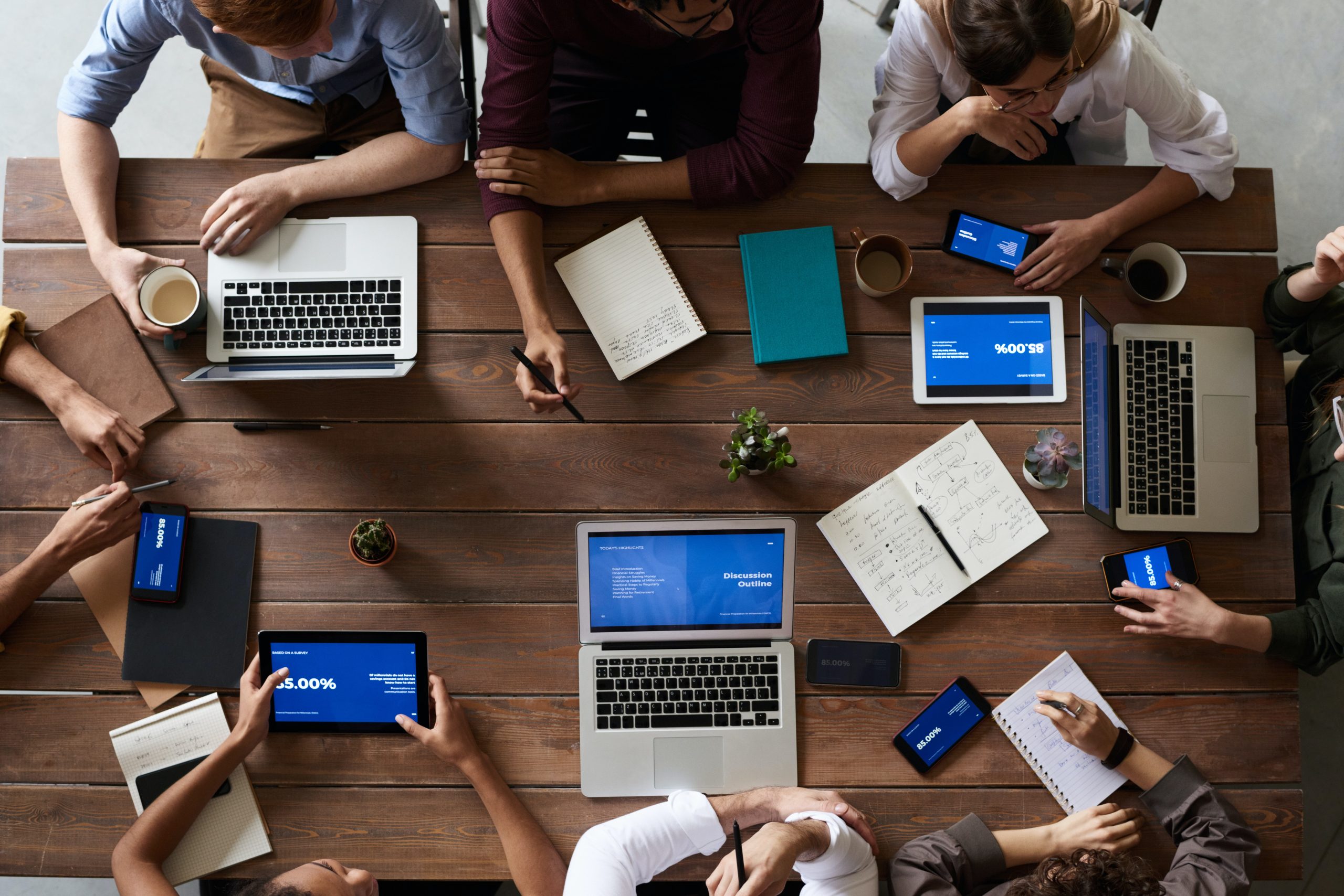 Group of realtor use laptop and tablet during meeting