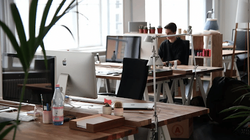 man-sitting-in-front-of-computer