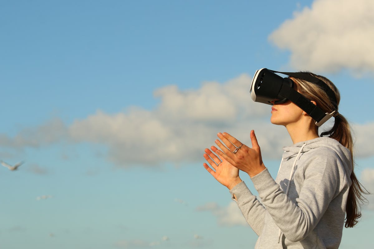 Real estate woman agent Using Vr Goggles Outdoors