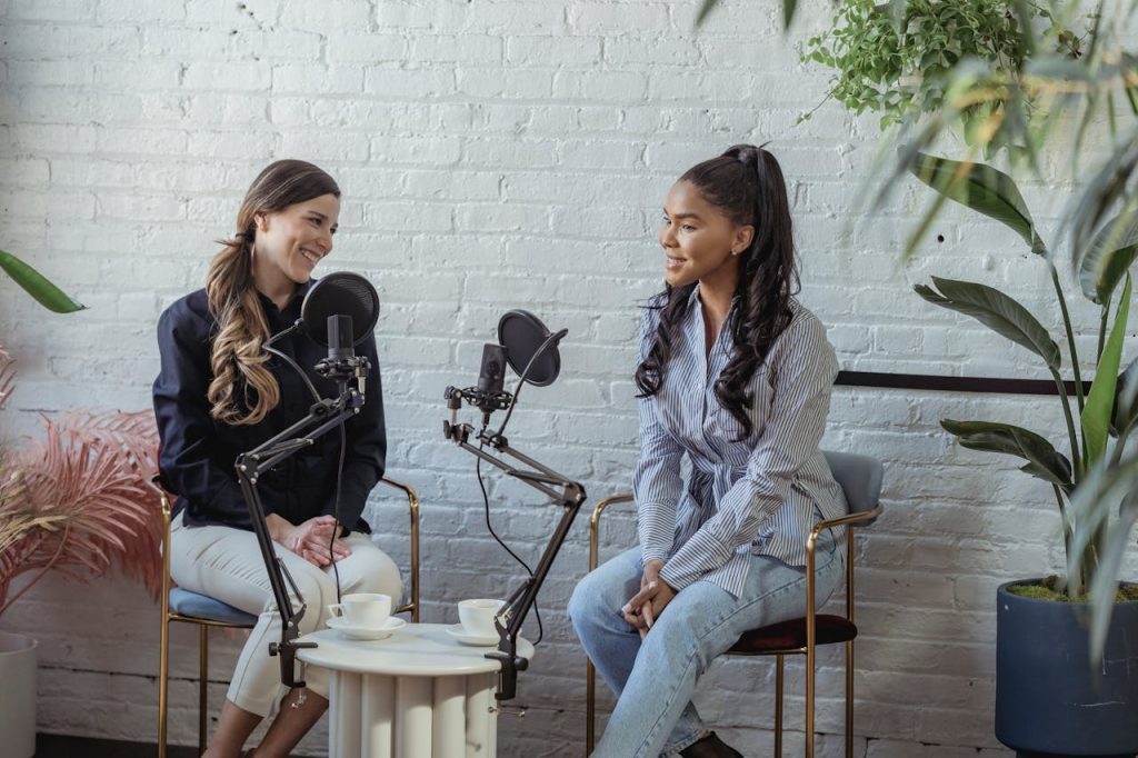 Multiethnic women talking in broadcasting studio