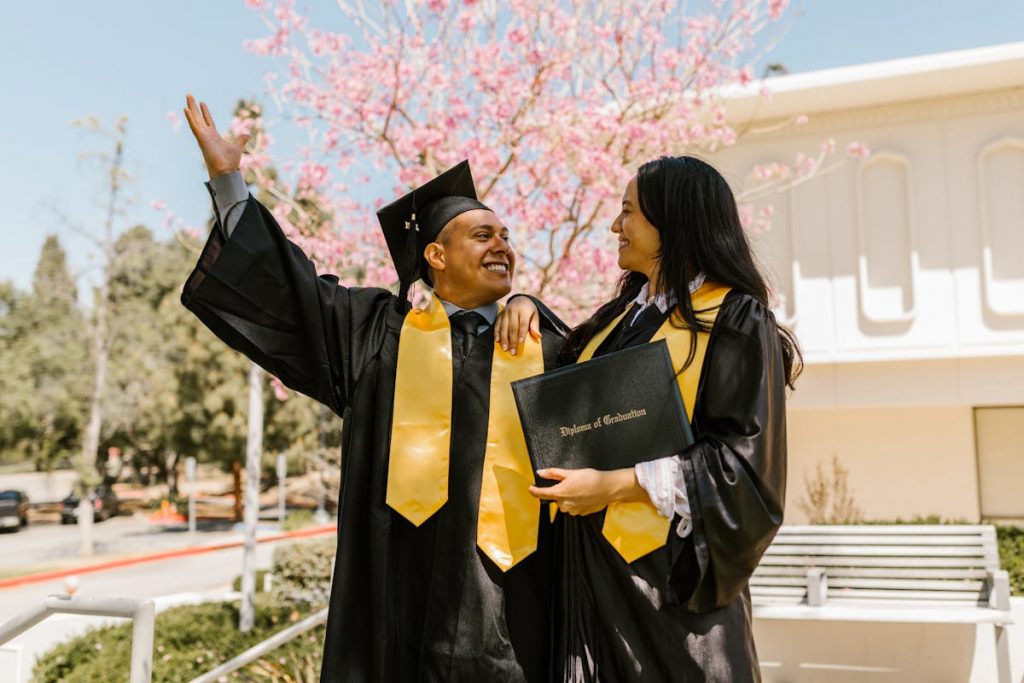 A Man and a Woman Wearing Academic Dress