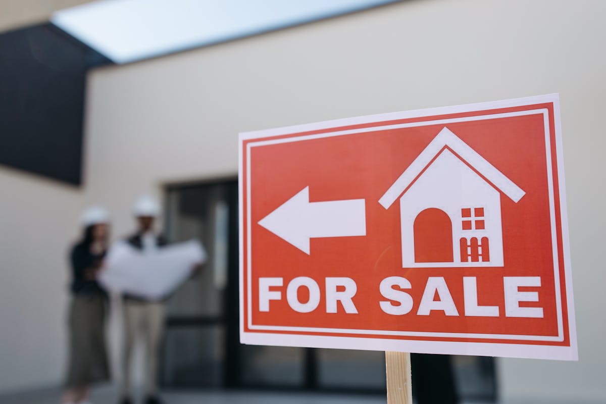 A For Sale Sign Advertising a Home